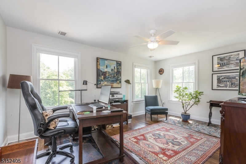 429 Green Village Road, Unit 2 Green Village, NJ 07935 - Photo 20 of 26 a view of a livingroom with furniture and a potted plant