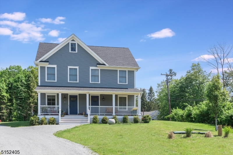 429 Green Village Road, Unit 2 Green Village, NJ 07935 - Photo 2 of 26 a front view of a house with a yard and trees
