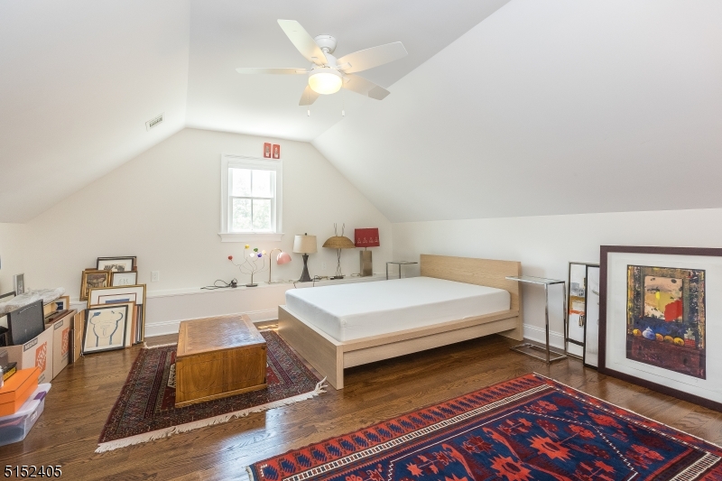 429 Green Village Road, Unit 2 Green Village, NJ 07935 - Photo 23 of 26 a bedroom with furniture and a baby crib