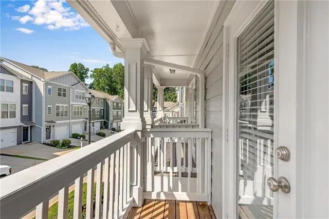 a view of a balcony with an outdoor space