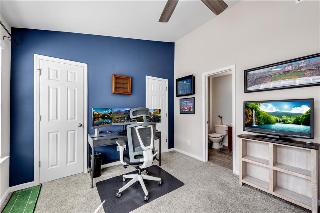 3039 Liberty Way Northwest Atlanta, GA 30318 - Photo 29 of 43 a view of a livingroom with furniture and a flat screen tv