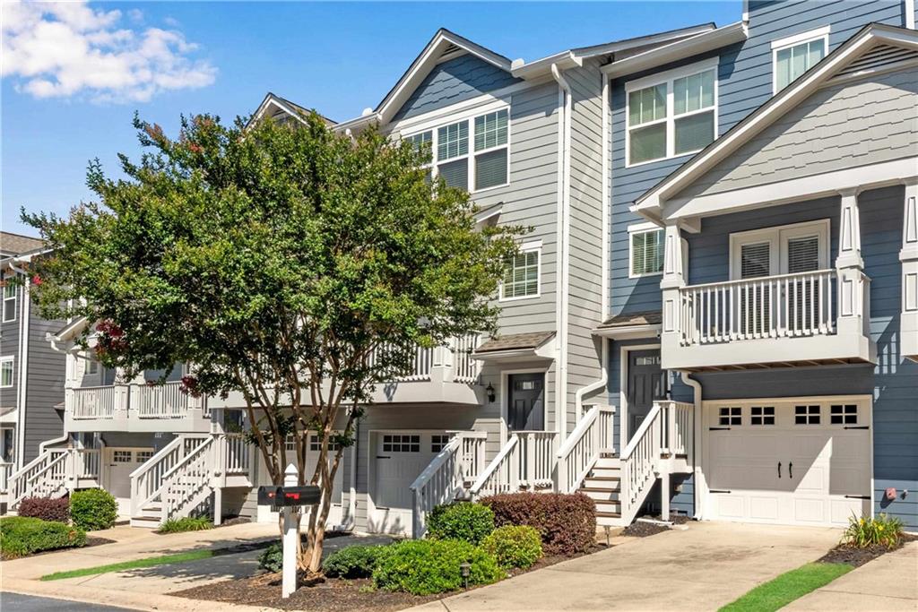 3039 Liberty Way Northwest Atlanta, GA 30318 - Photo 3 of 43 a front view of a house with a tree