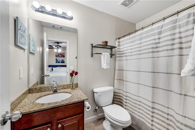 a view of a house with wooden deck