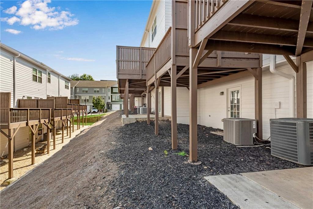 3039 Liberty Way Northwest Atlanta, GA 30318 - Photo 36 of 43 a view of a house with a backyard