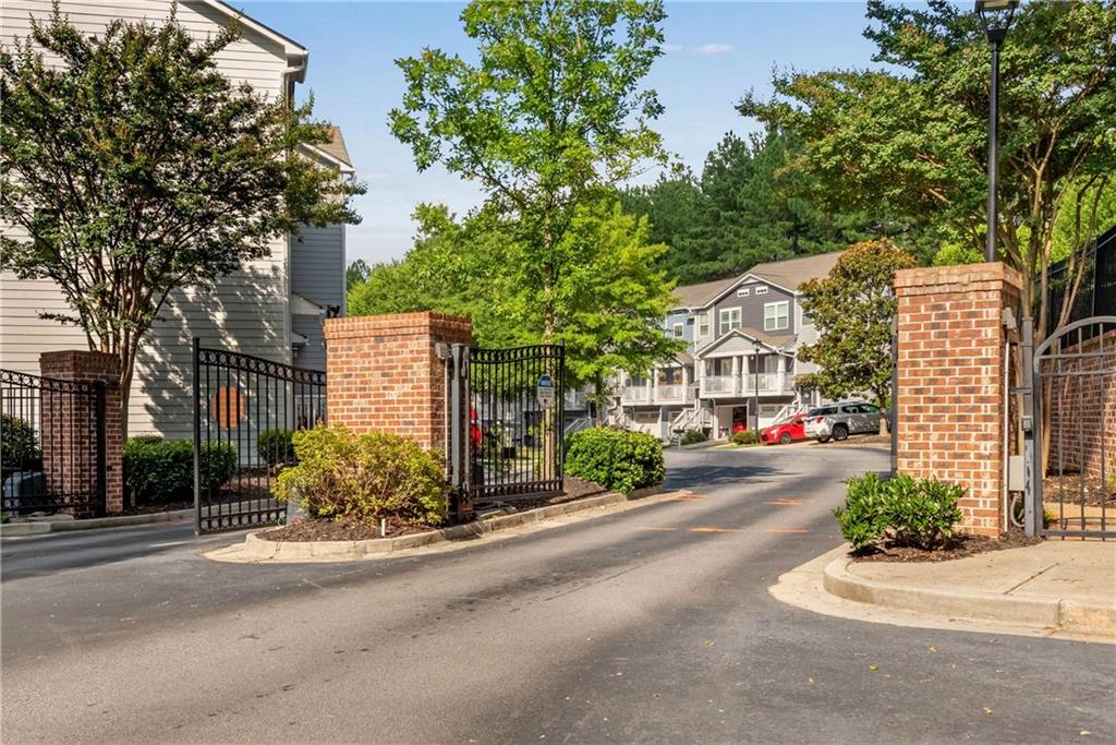 3039 Liberty Way Northwest Atlanta, GA 30318 - Photo 39 of 43 front view of a house with a street