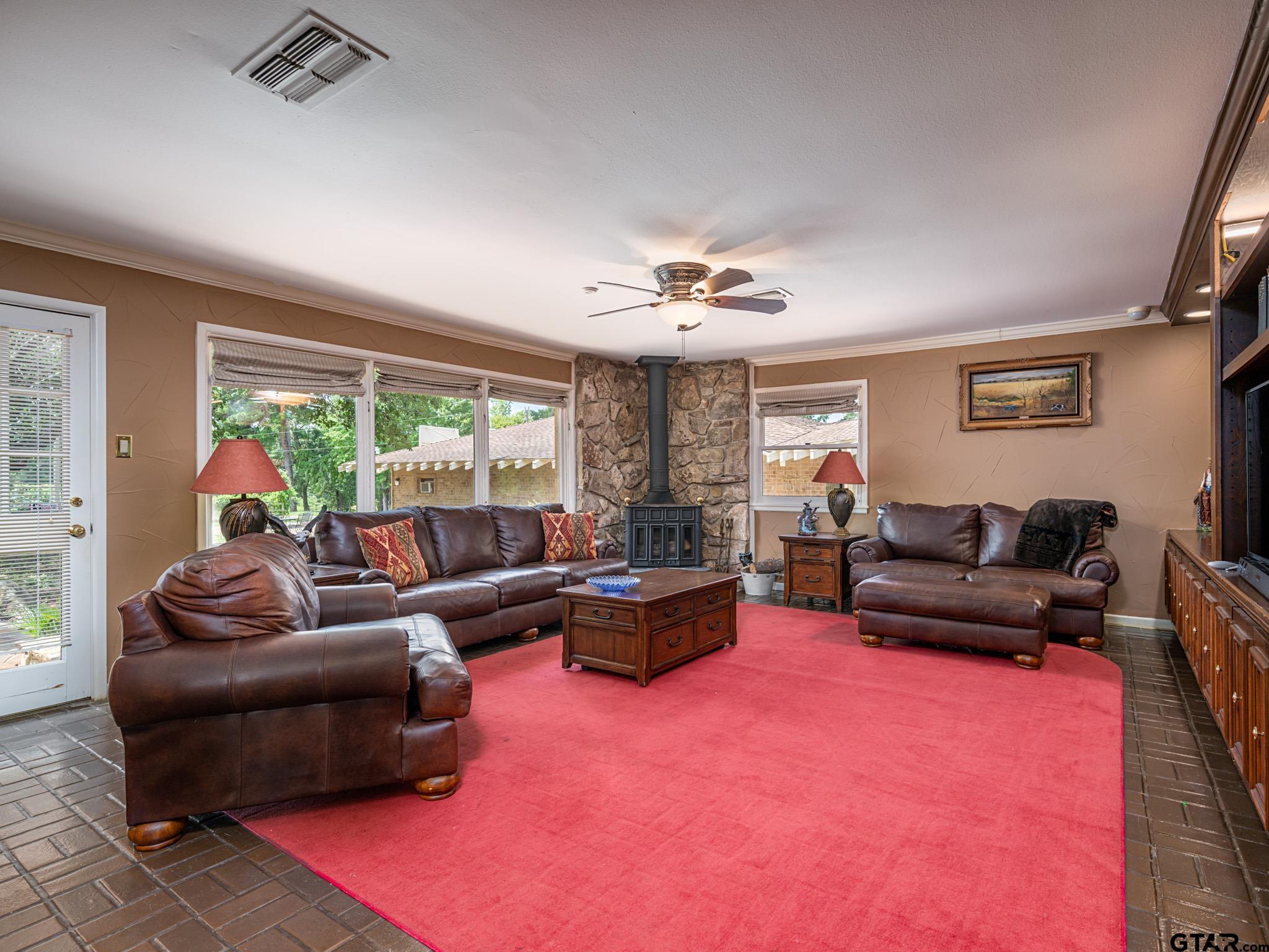 16611 Old Noonday Road Tyler, TX 75703 - Photo 12 of 46 a living room with furniture and a large window