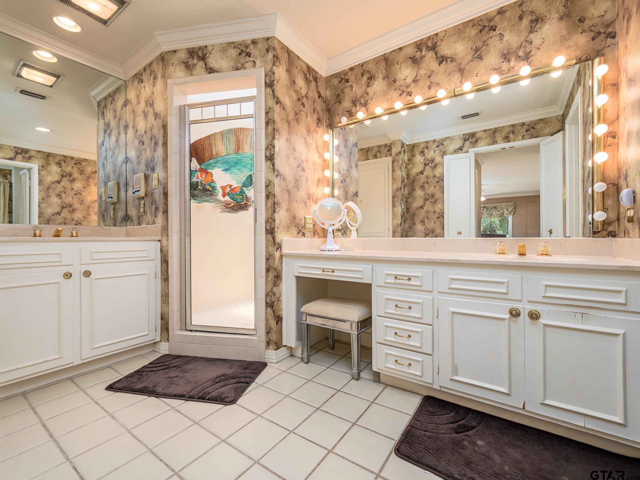 16611 Old Noonday Road Tyler, TX 75703 - Photo 16 of 46 a bathroom with a sink a vanity and a mirror