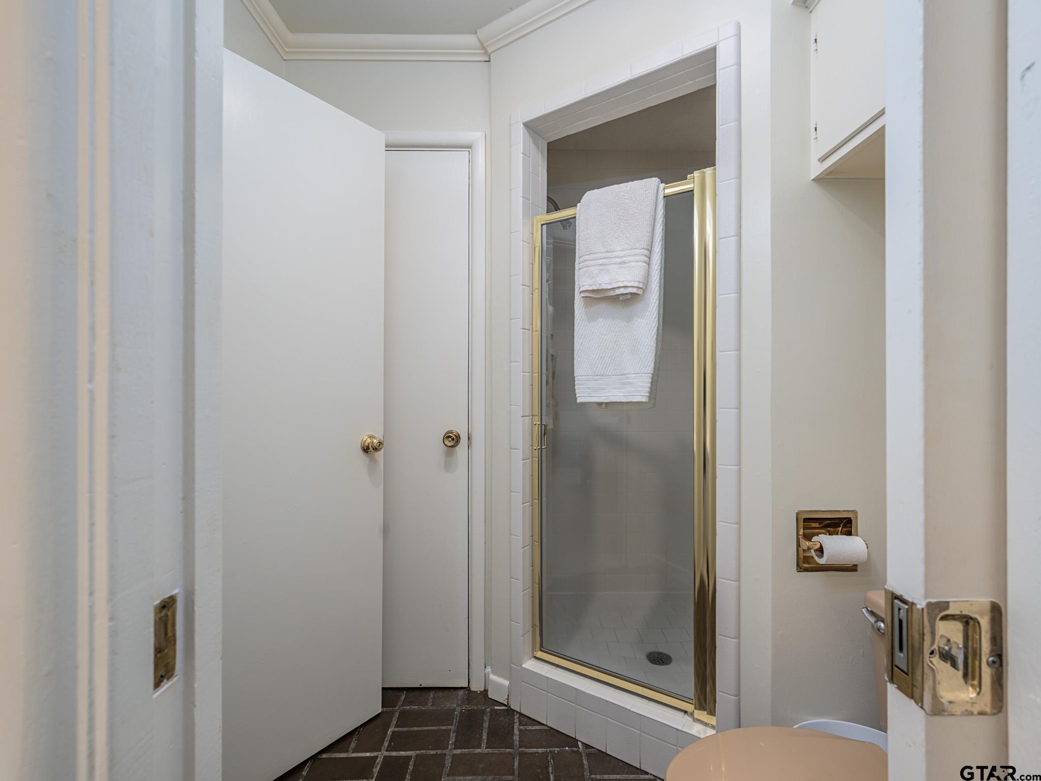 16611 Old Noonday Road Tyler, TX 75703 - Photo 22 of 46 a bathroom with a shower and toilet