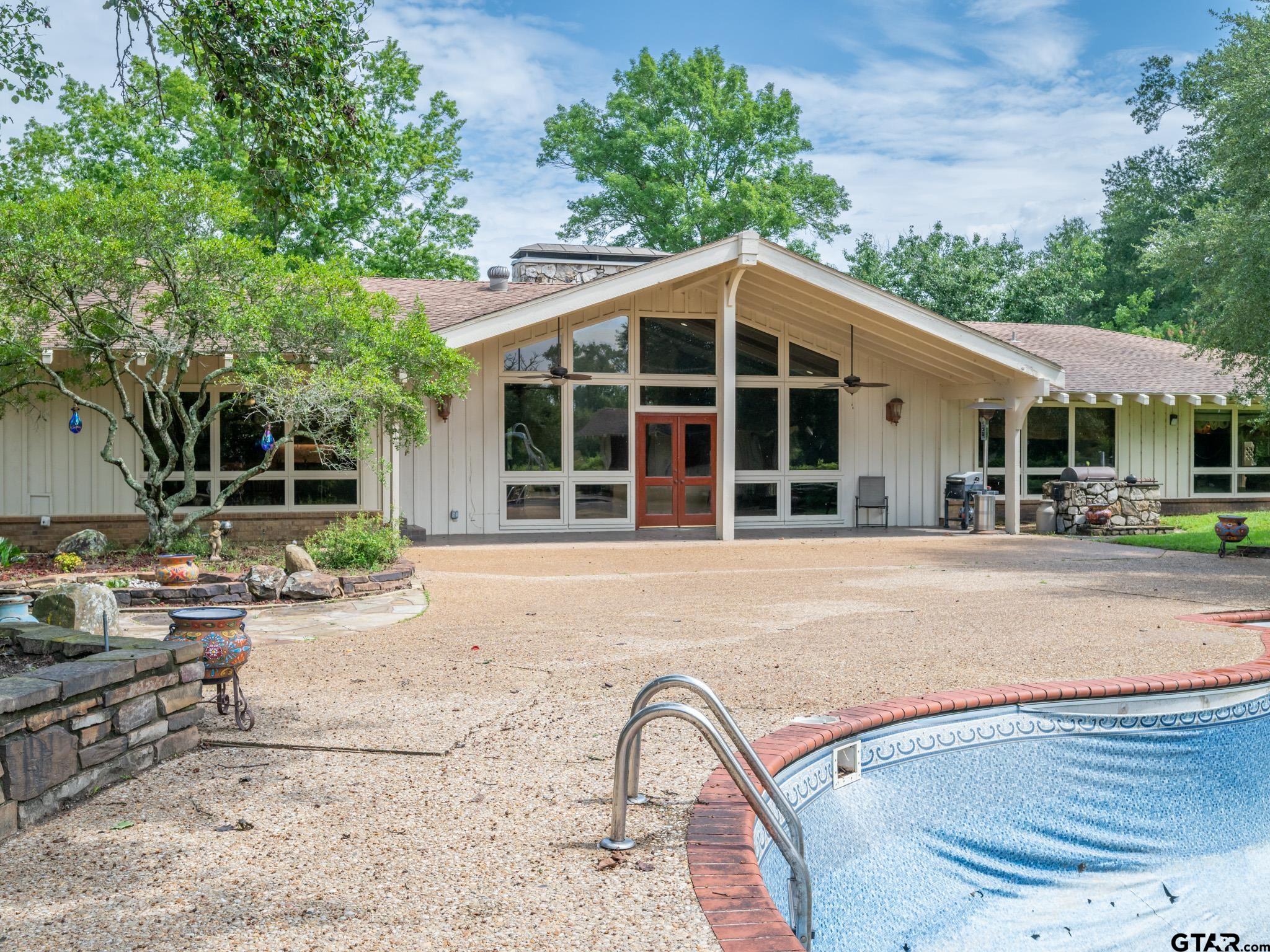 16611 Old Noonday Road Tyler, TX 75703 - Photo 25 of 46 a front view of a house with garden