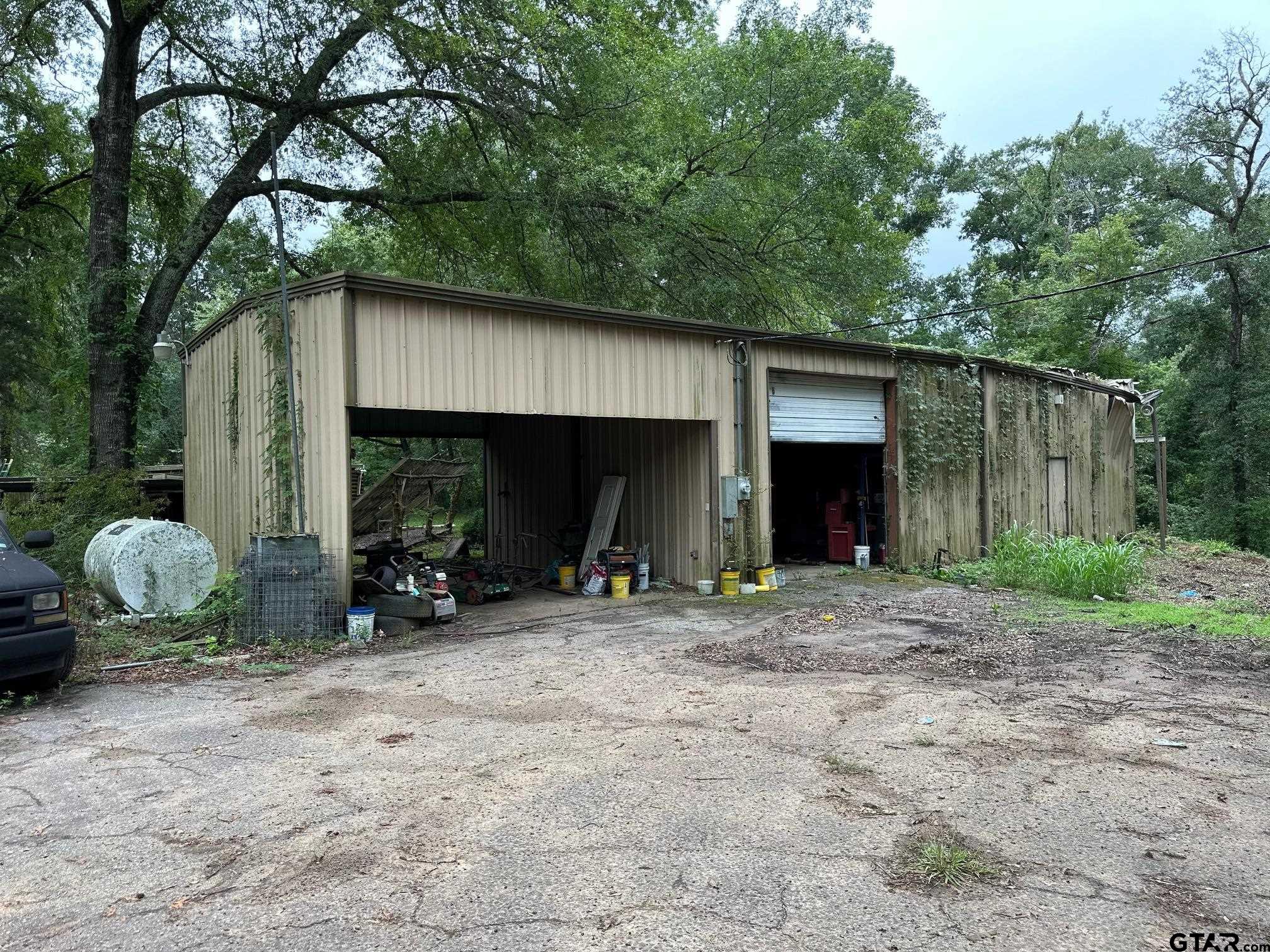 16611 Old Noonday Road Tyler, TX 75703 - Photo 39 of 46 a view of a house with backyard and outdoor space