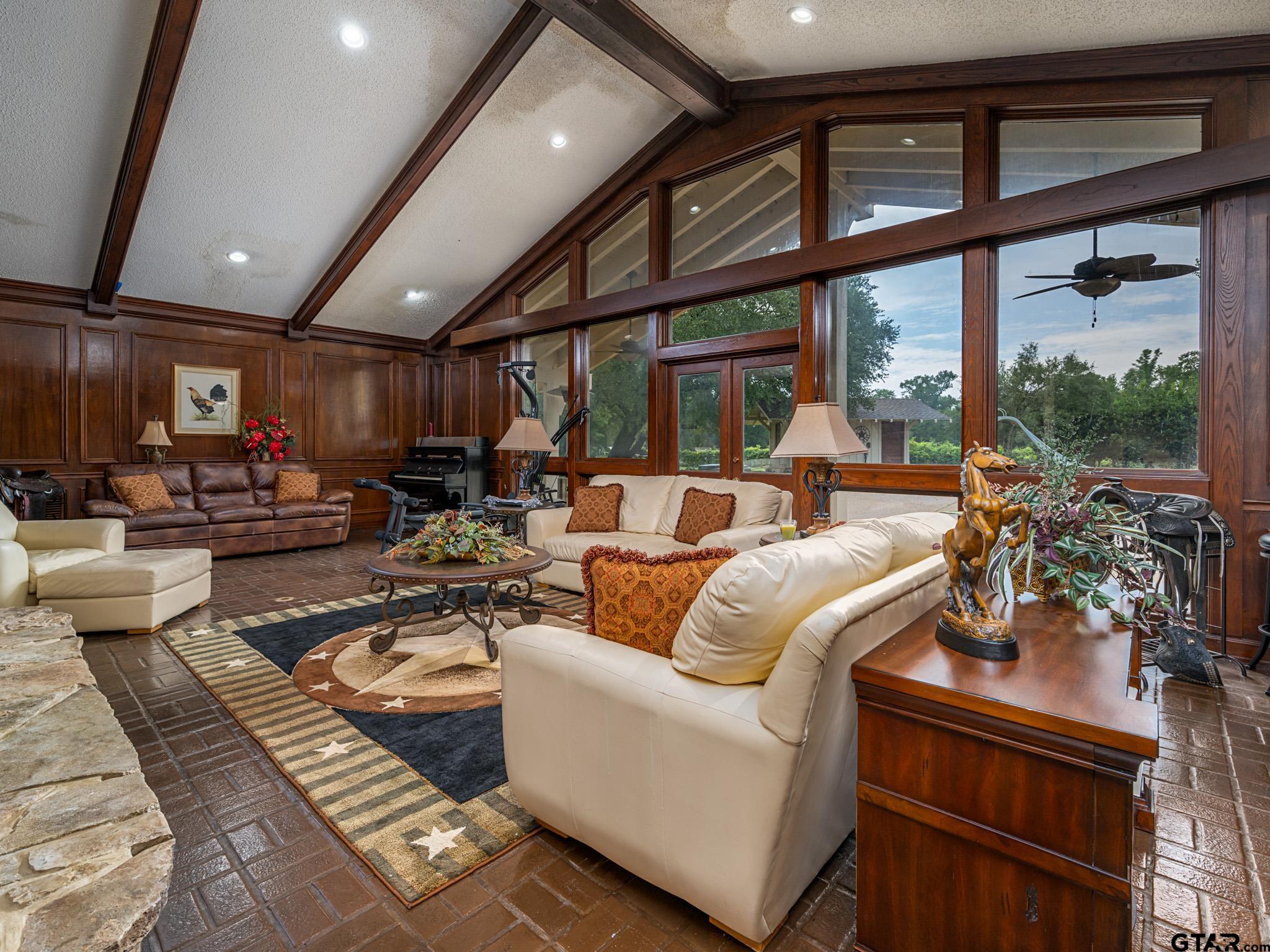 16611 Old Noonday Road Tyler, TX 75703 - Photo 4 of 46 a living room with furniture and a large window