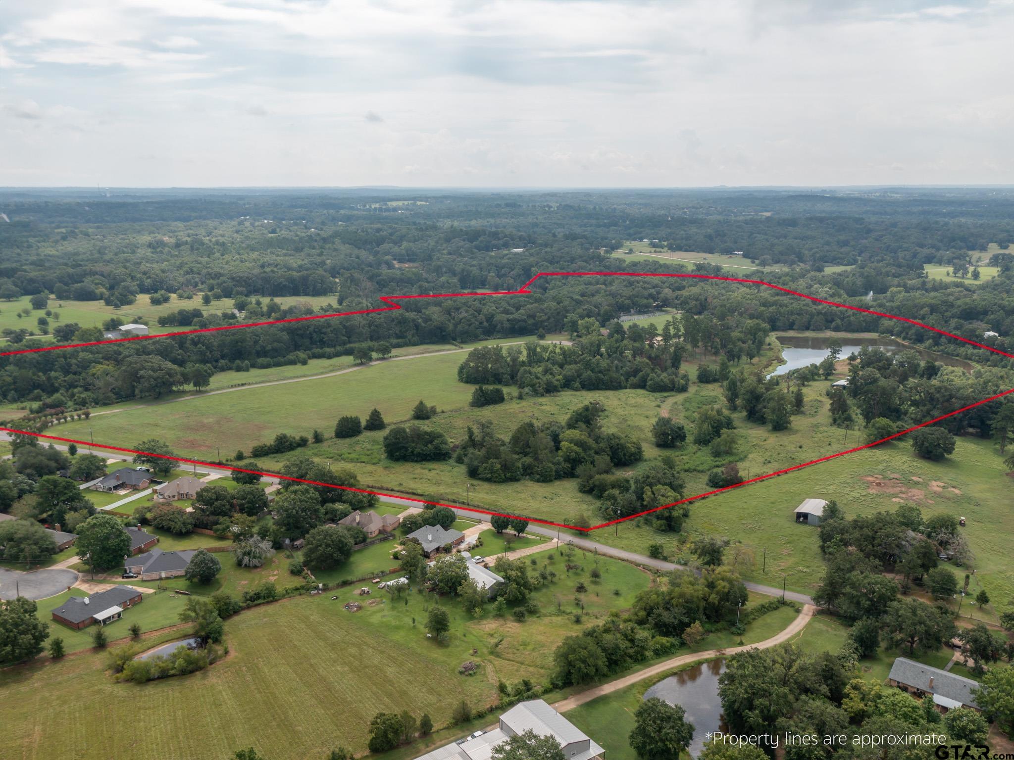16611 Old Noonday Road Tyler, TX 75703 - Photo 46 of 46 an aerial view of residential building and lake