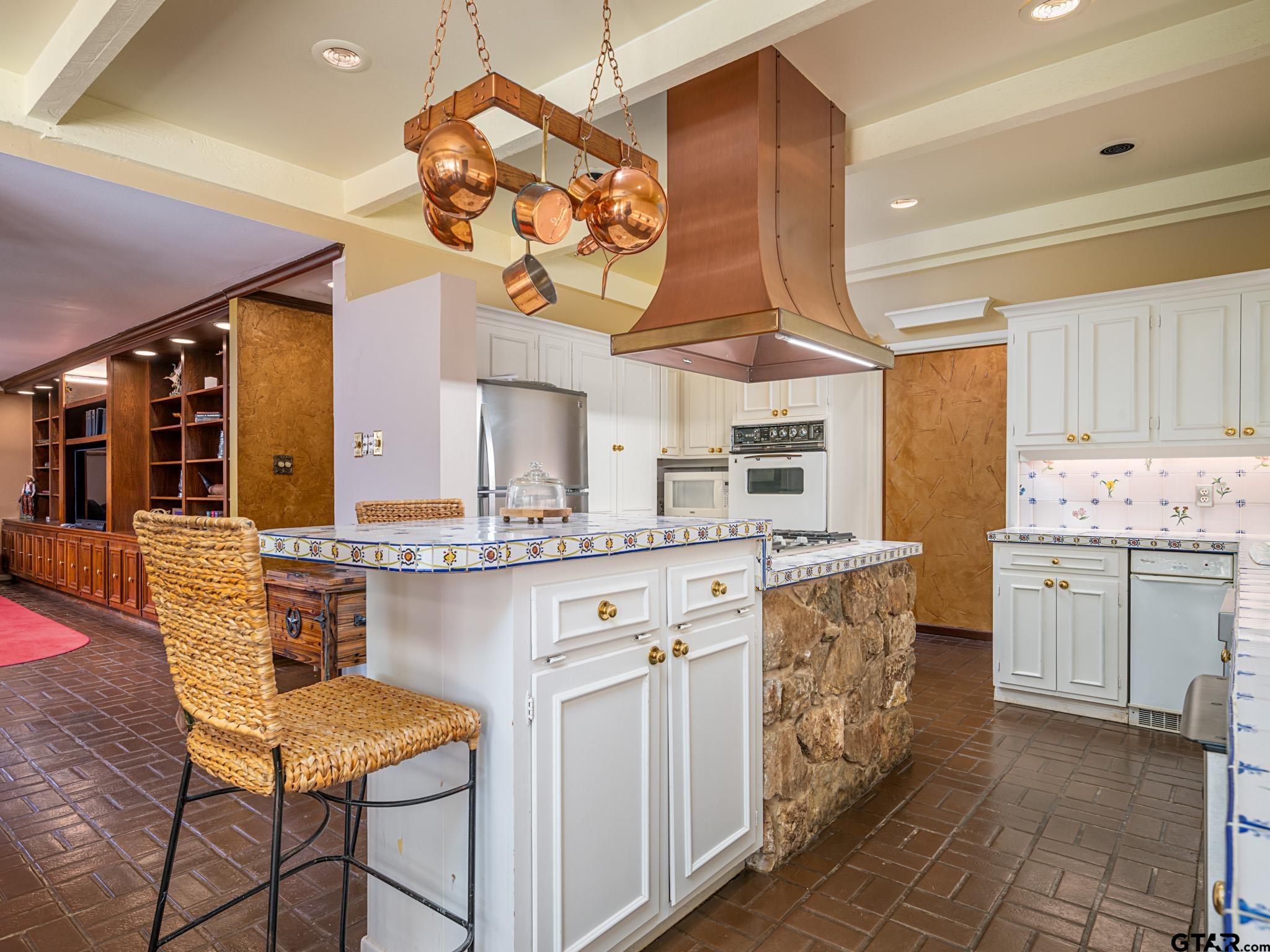 16611 Old Noonday Road Tyler, TX 75703 - Photo 10 of 46 a kitchen with cabinets and window