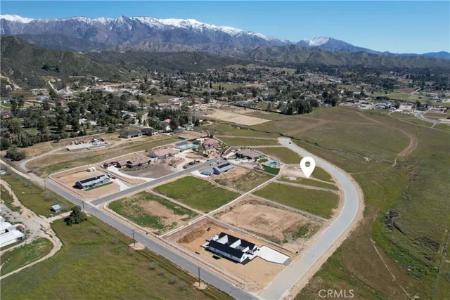 aerial view of a house with a outdoor space