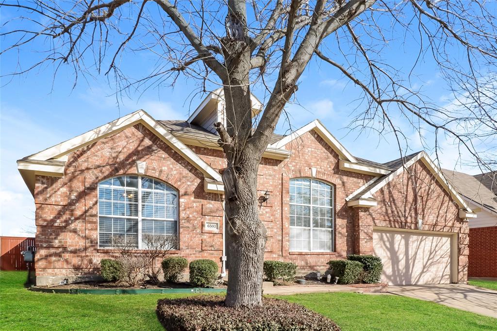 front view of house with a yard