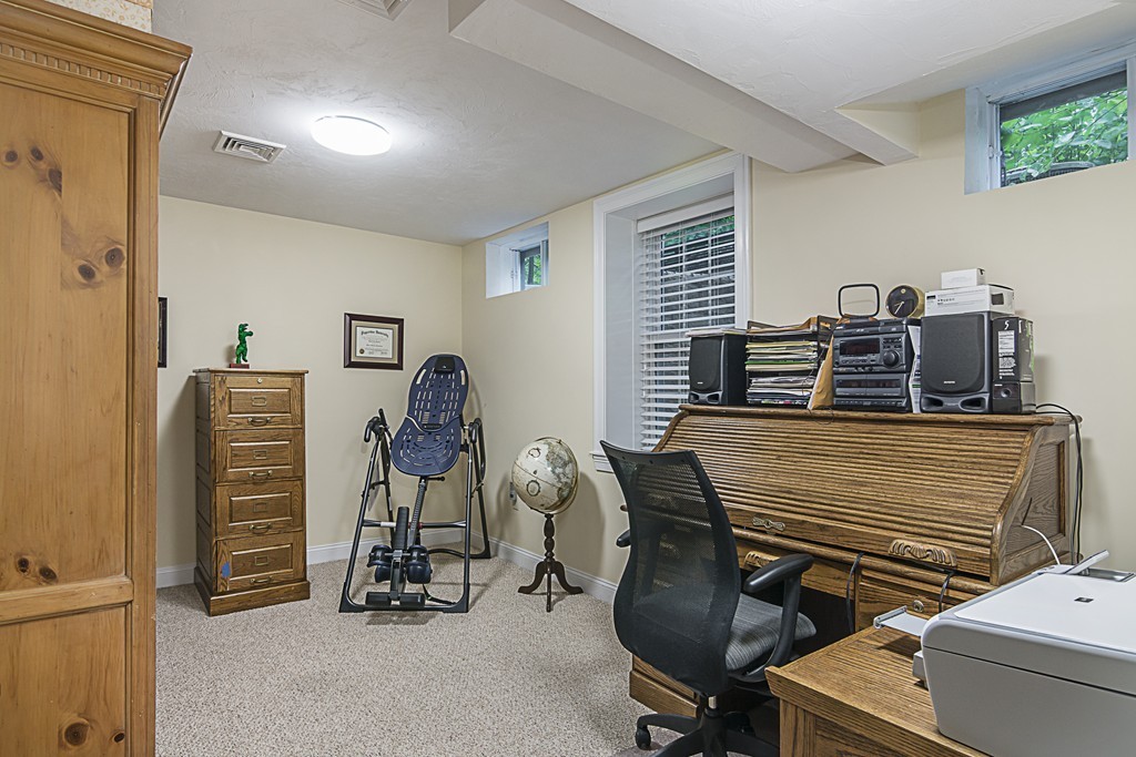 6 Robinson Road, Unit 16 Lexington, MA 02420 - Photo 17 of 20 a view of a workspace with furniture
