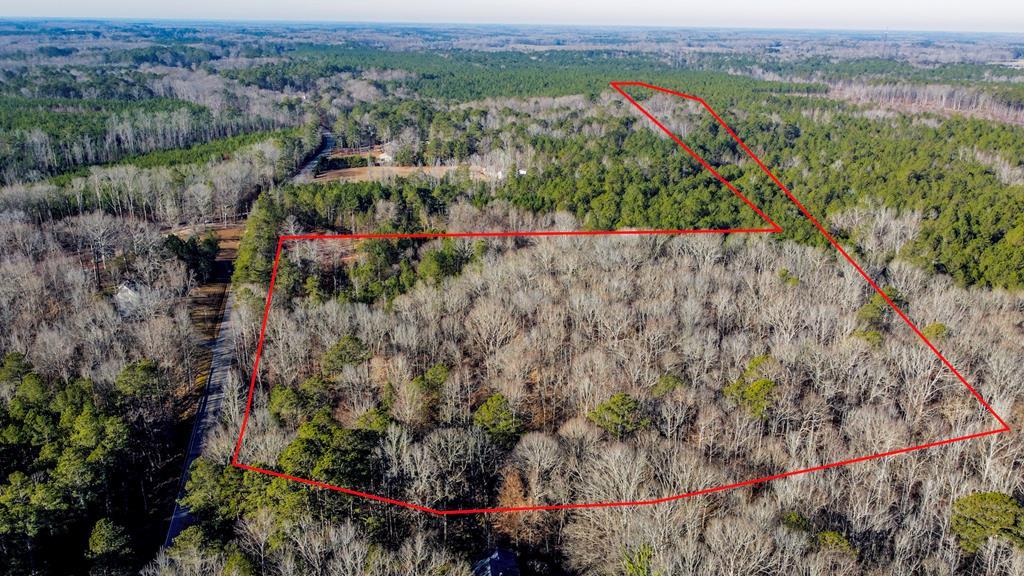 0 Whip O Will Road Abbeville, SC 29620 - Photo 1 of 3 This aerial view showcases a sprawling wooded lot, offering a tranquil retreat with ample space.