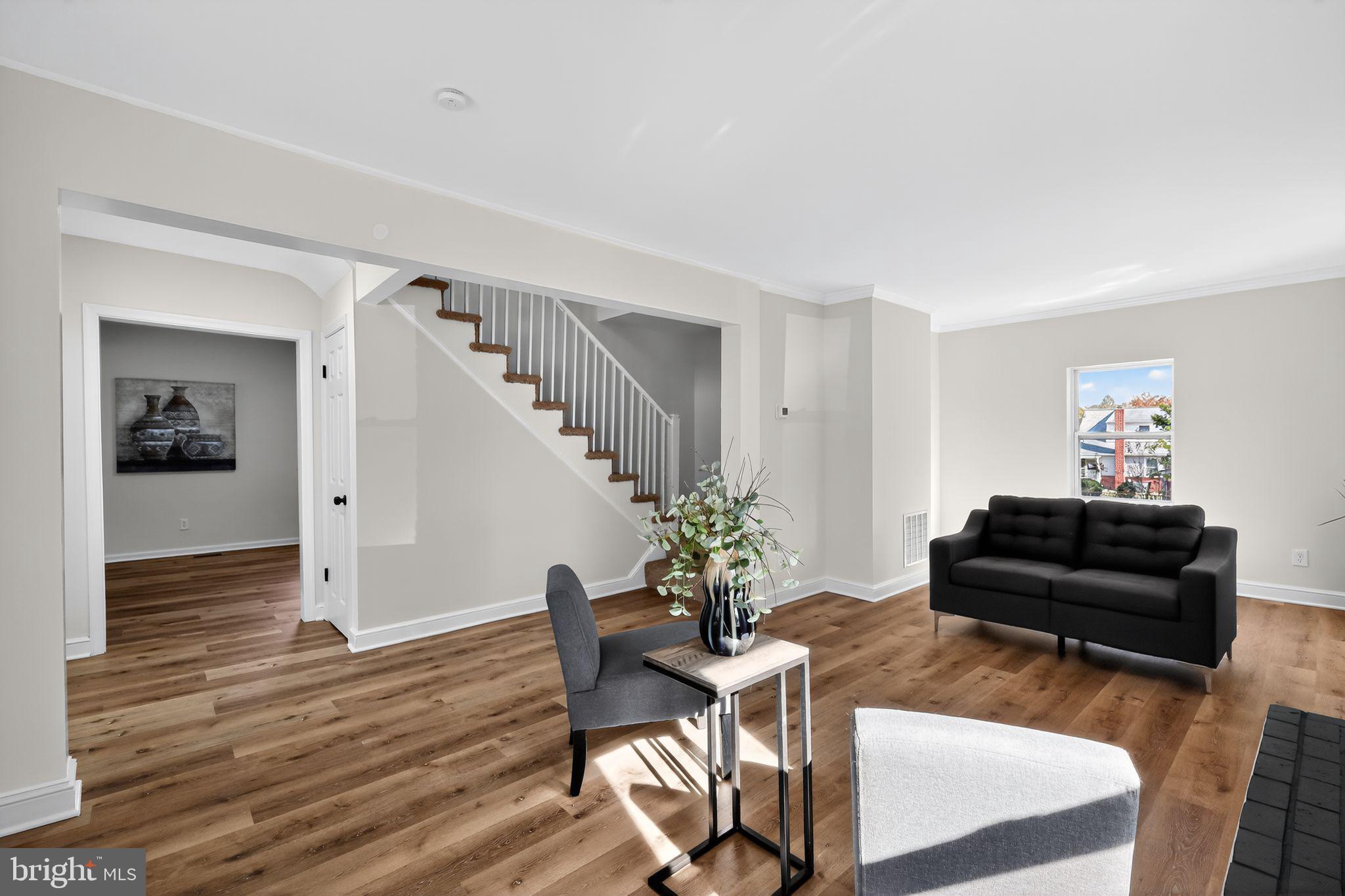 4508 Yates Road Beltsville, MD 20705 - Photo 11 of 25 a living room with furniture and wooden floor