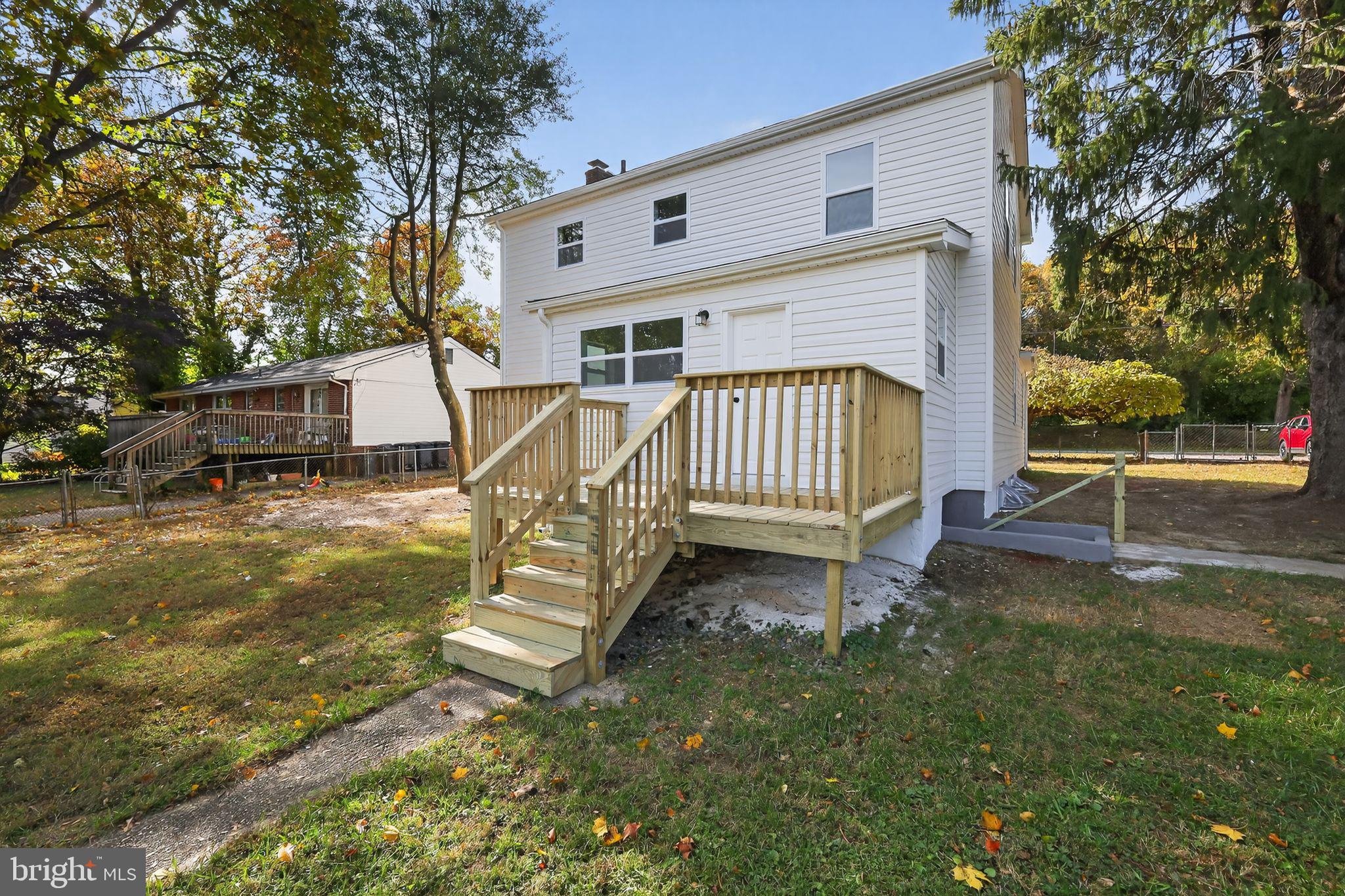 4508 Yates Road Beltsville, MD 20705 - Photo 23 of 25 a view of a house with backyard and a tree