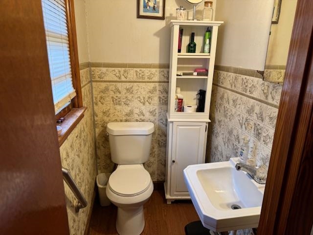 110 Levoid Road Bolivar, TN 38008 - Photo 13 of 22 a white toilet sitting next to a bathroom sink