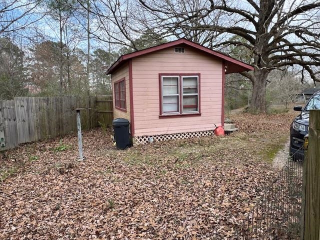 110 Levoid Road Bolivar, TN 38008 - Photo 17 of 22 a front view of a house with garden