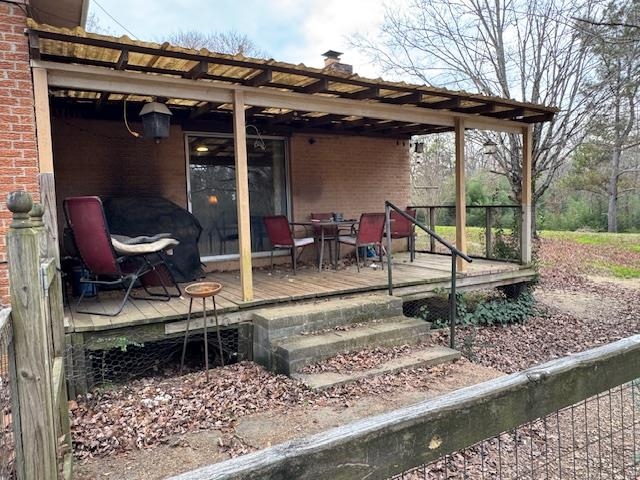 110 Levoid Road Bolivar, TN 38008 - Photo 3 of 22 a view of a lounge chair and table in the patio