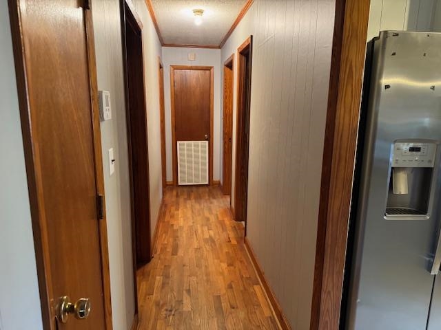 110 Levoid Road Bolivar, TN 38008 - Photo 8 of 22 a view of hallway with wooden floor