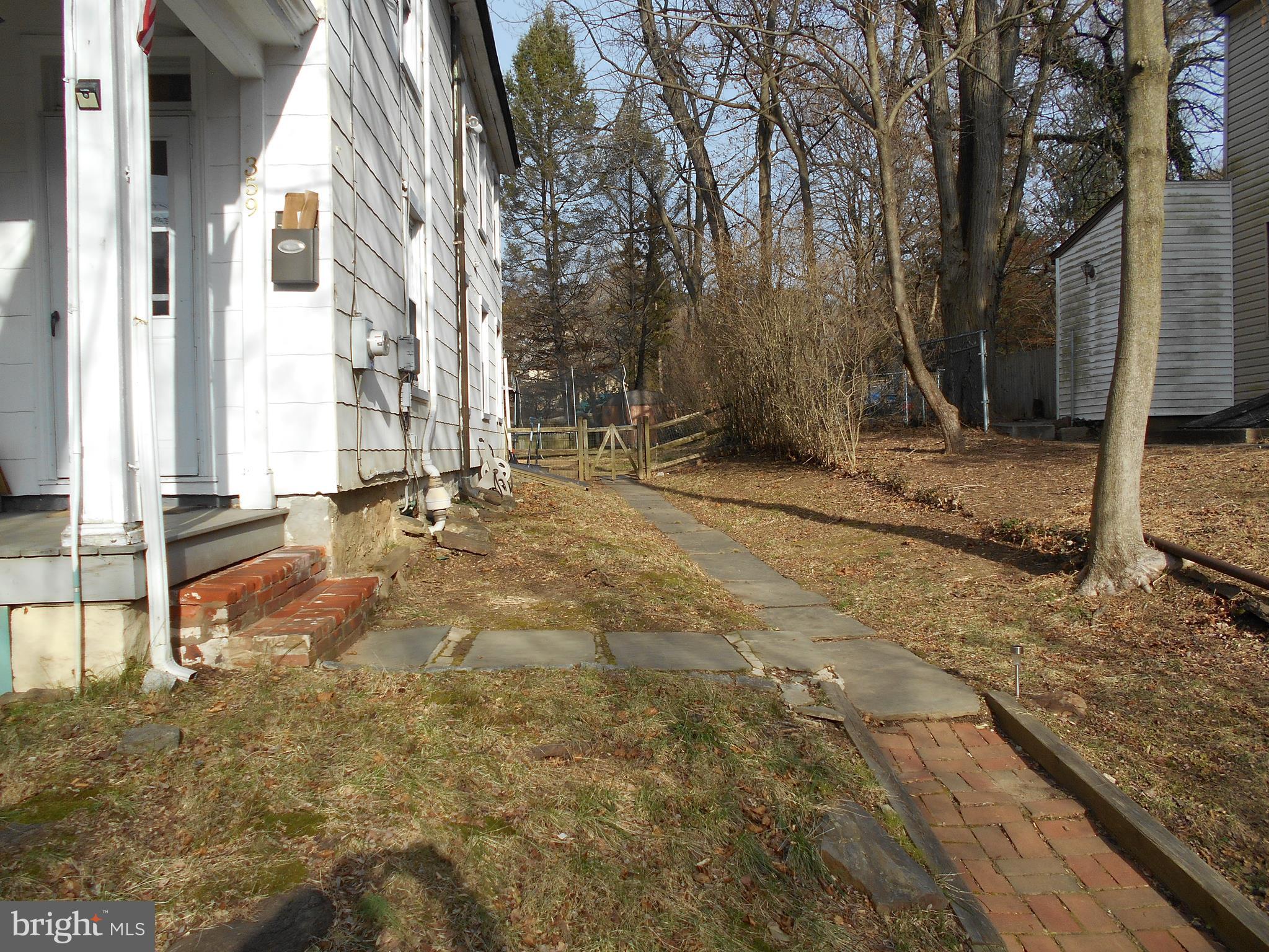 359 Church Road Elkins Park, PA 19027 - Photo 3 of 23 Pathway to side of house