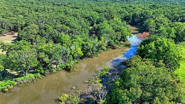 a view of a lake view with a garden