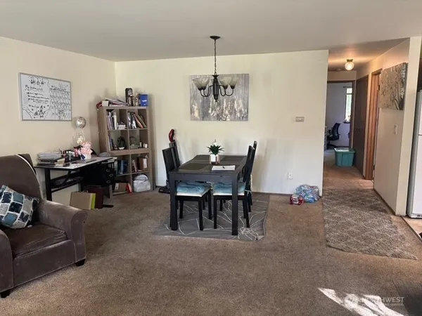 a view of a dining room with furniture