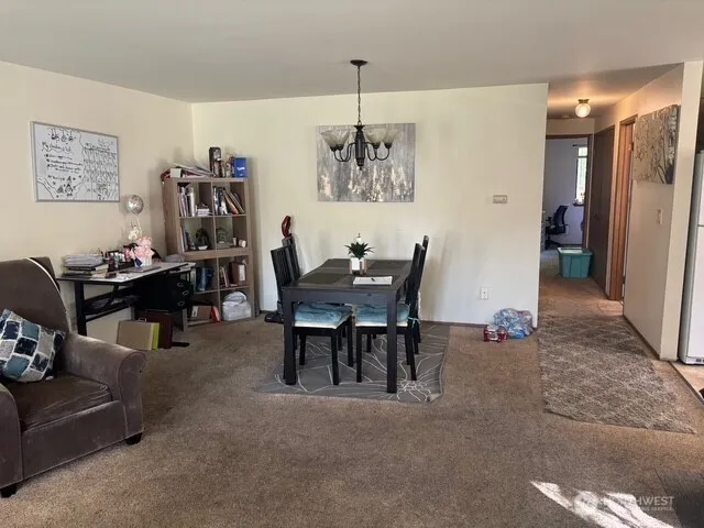 a view of a dining room with furniture