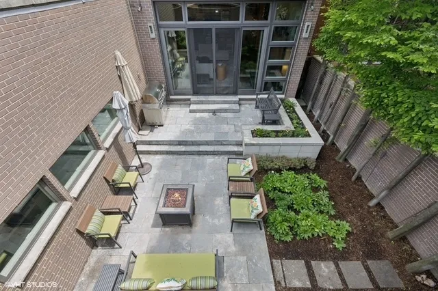 a view of balcony with furniture