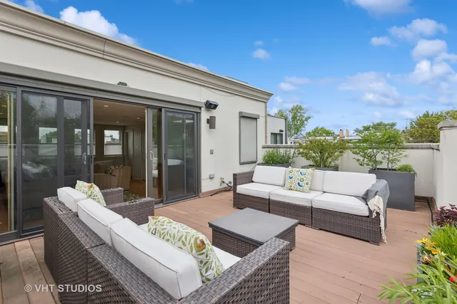 a outdoor living space with furniture and city view
