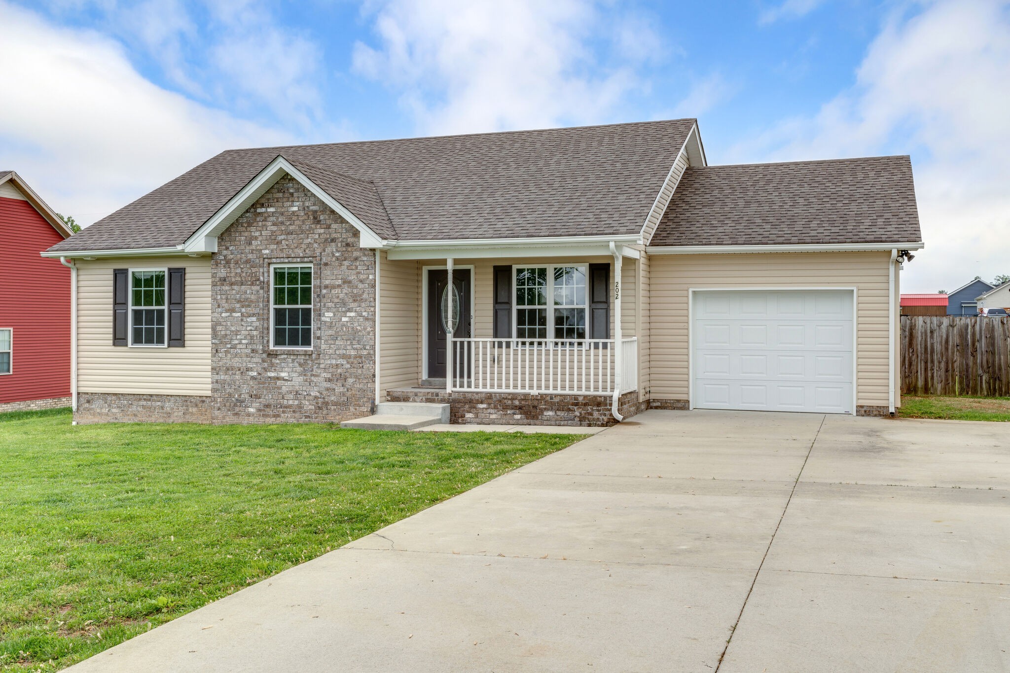 202 Shaub Road Portland, TN 37148 - Photo 2 of 25 a front view of a house with a yard