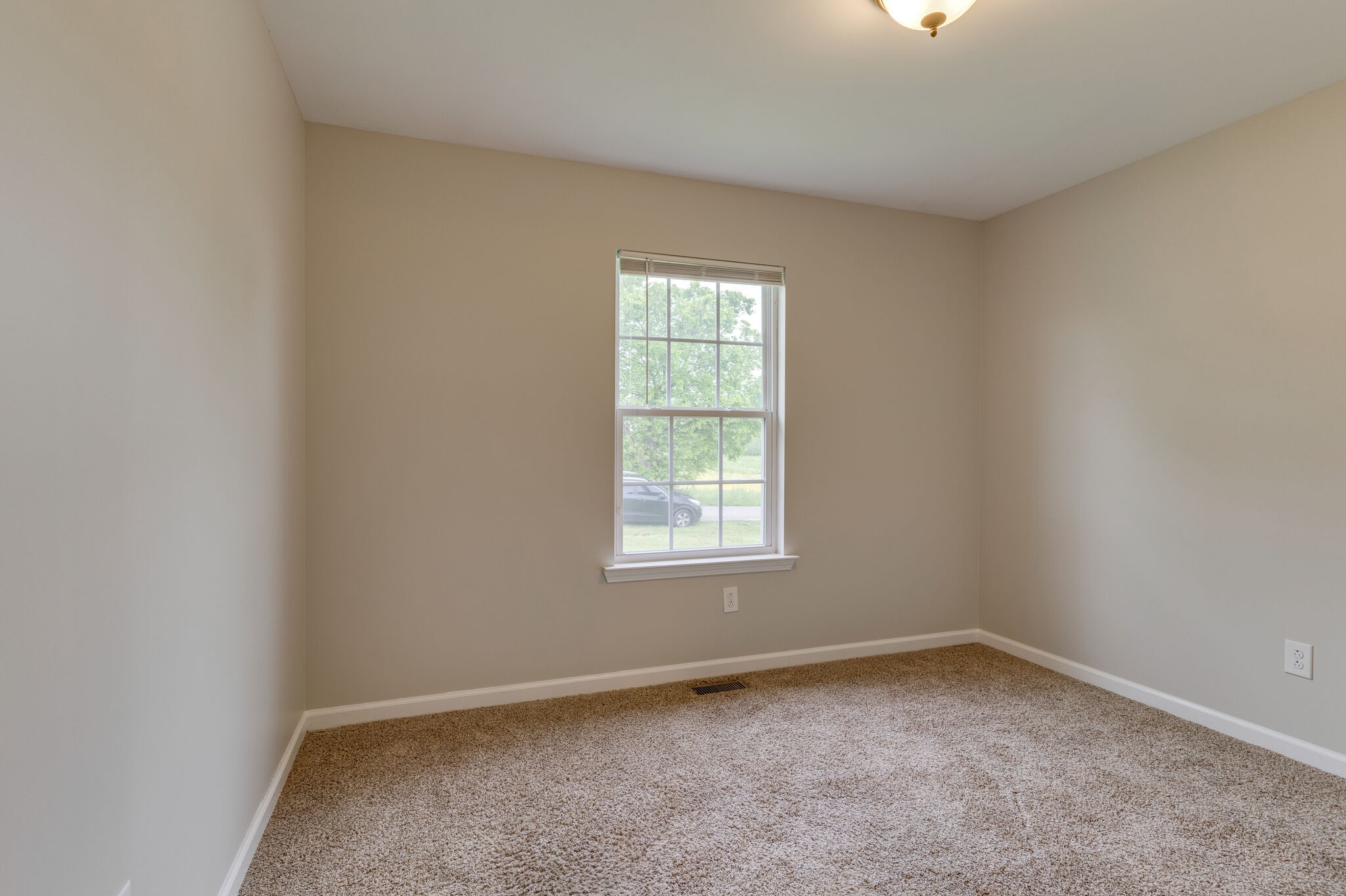 202 Shaub Road Portland, TN 37148 - Photo 14 of 25 an empty room with a window