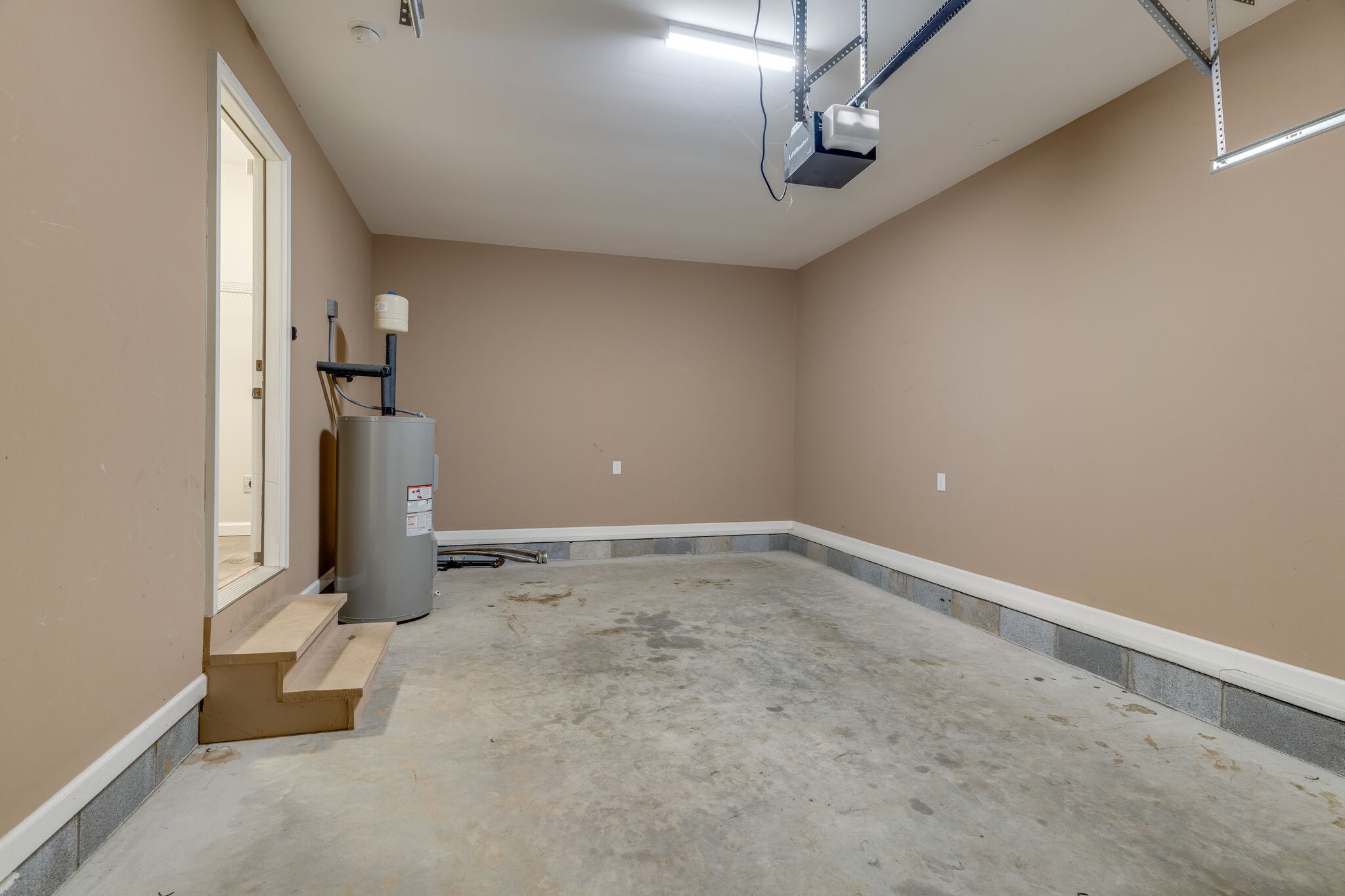 202 Shaub Road Portland, TN 37148 - Photo 20 of 25 an empty room with a ceiling fan