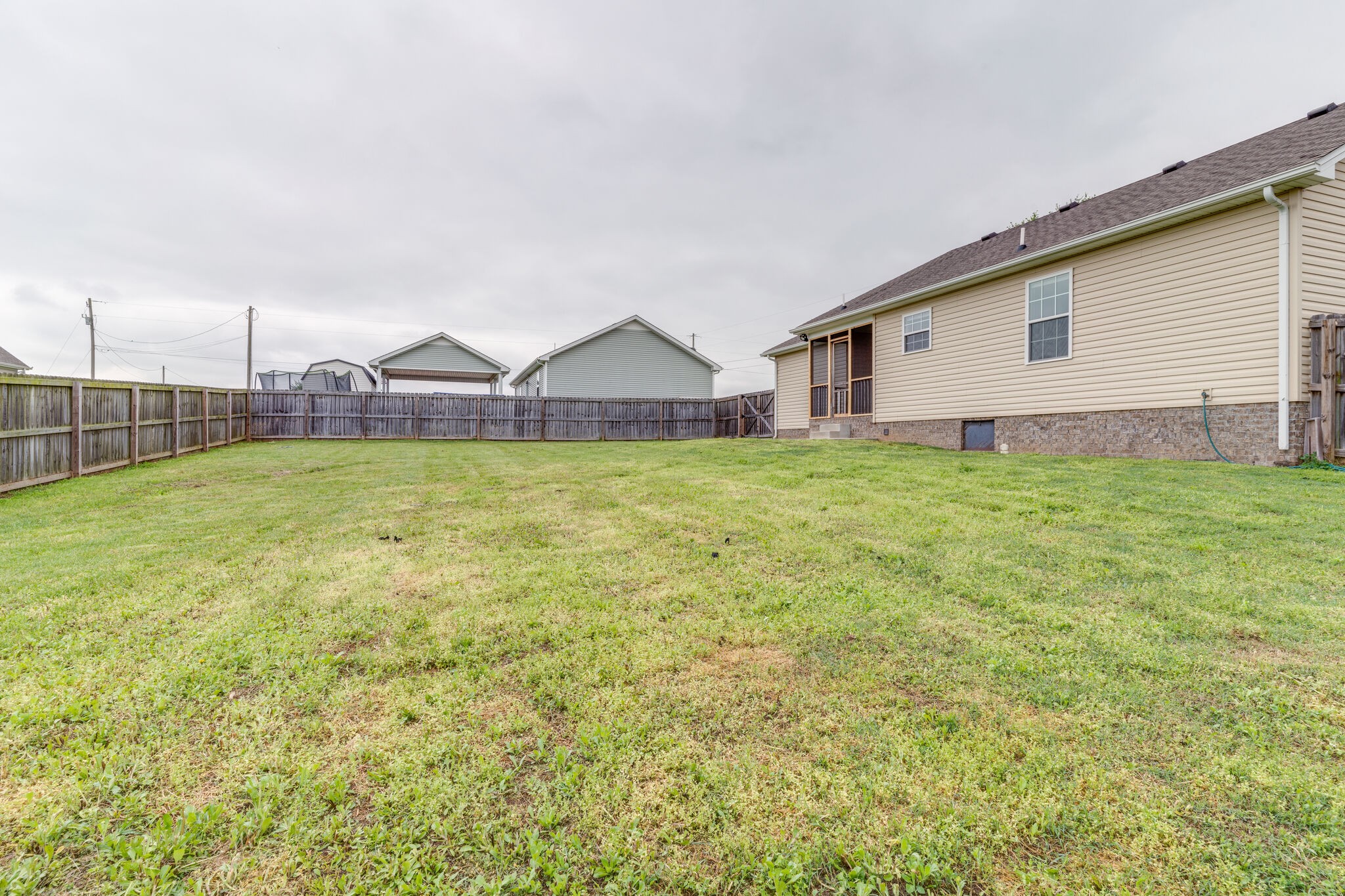 202 Shaub Road Portland, TN 37148 - Photo 25 of 25 a view of a house with a yard and a large tree