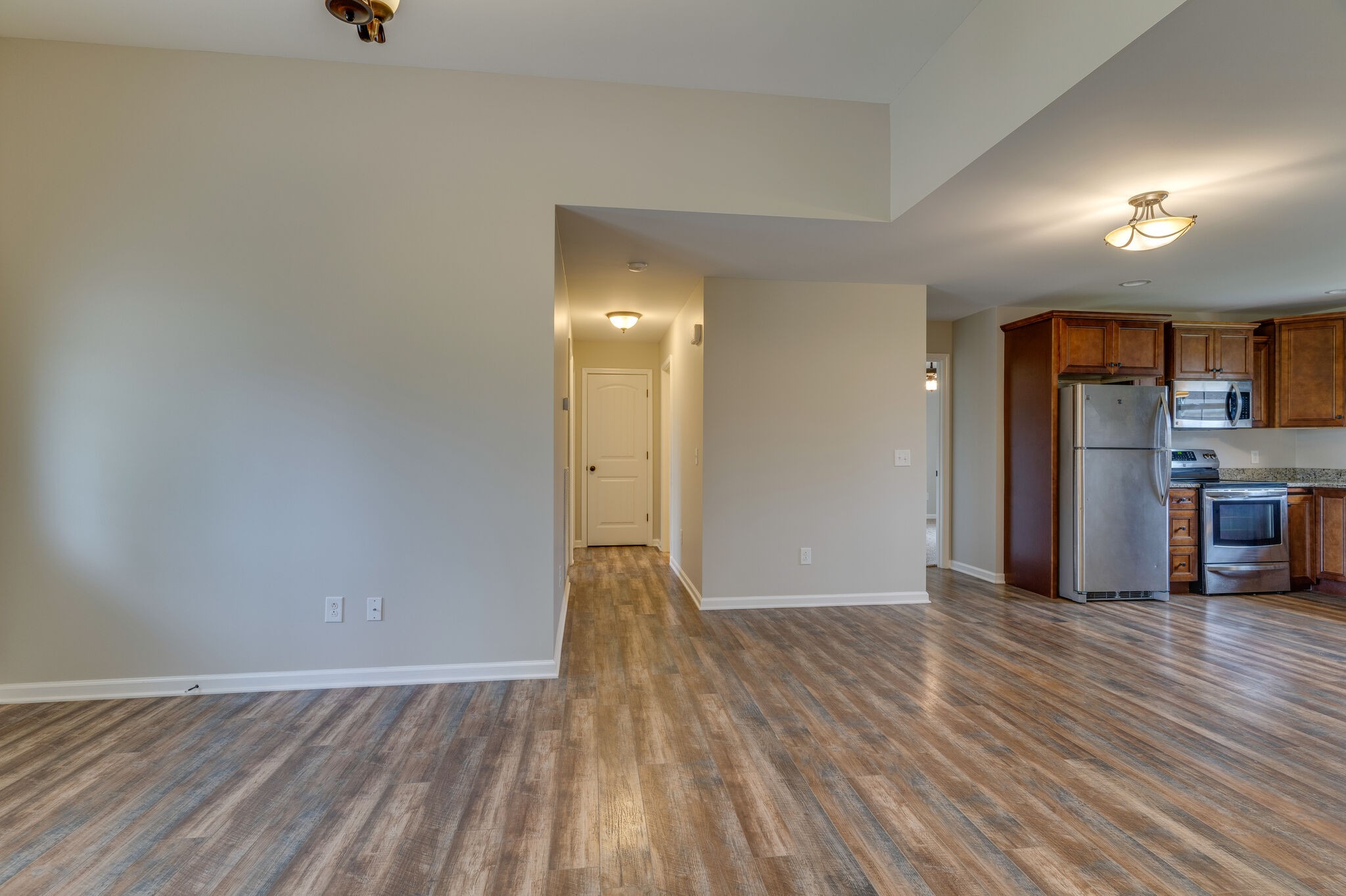 202 Shaub Road Portland, TN 37148 - Photo 5 of 25 a view of empty room with wooden floor