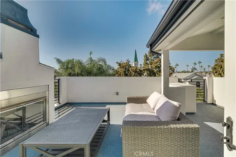 a view of a city with lush green forest