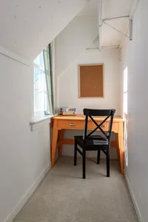 a room with furniture and window