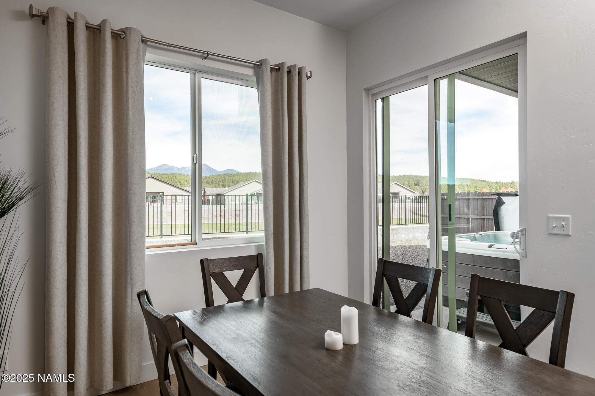 11780 Pegasus Road Bellemont, AZ 86015 - Photo 15 of 44 a view of a dining room with furniture and window