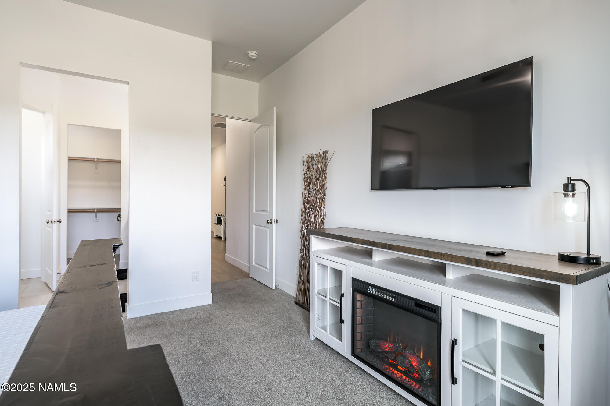 11780 Pegasus Road Bellemont, AZ 86015 - Photo 31 of 44 a view of a livingroom with furniture and a fireplace