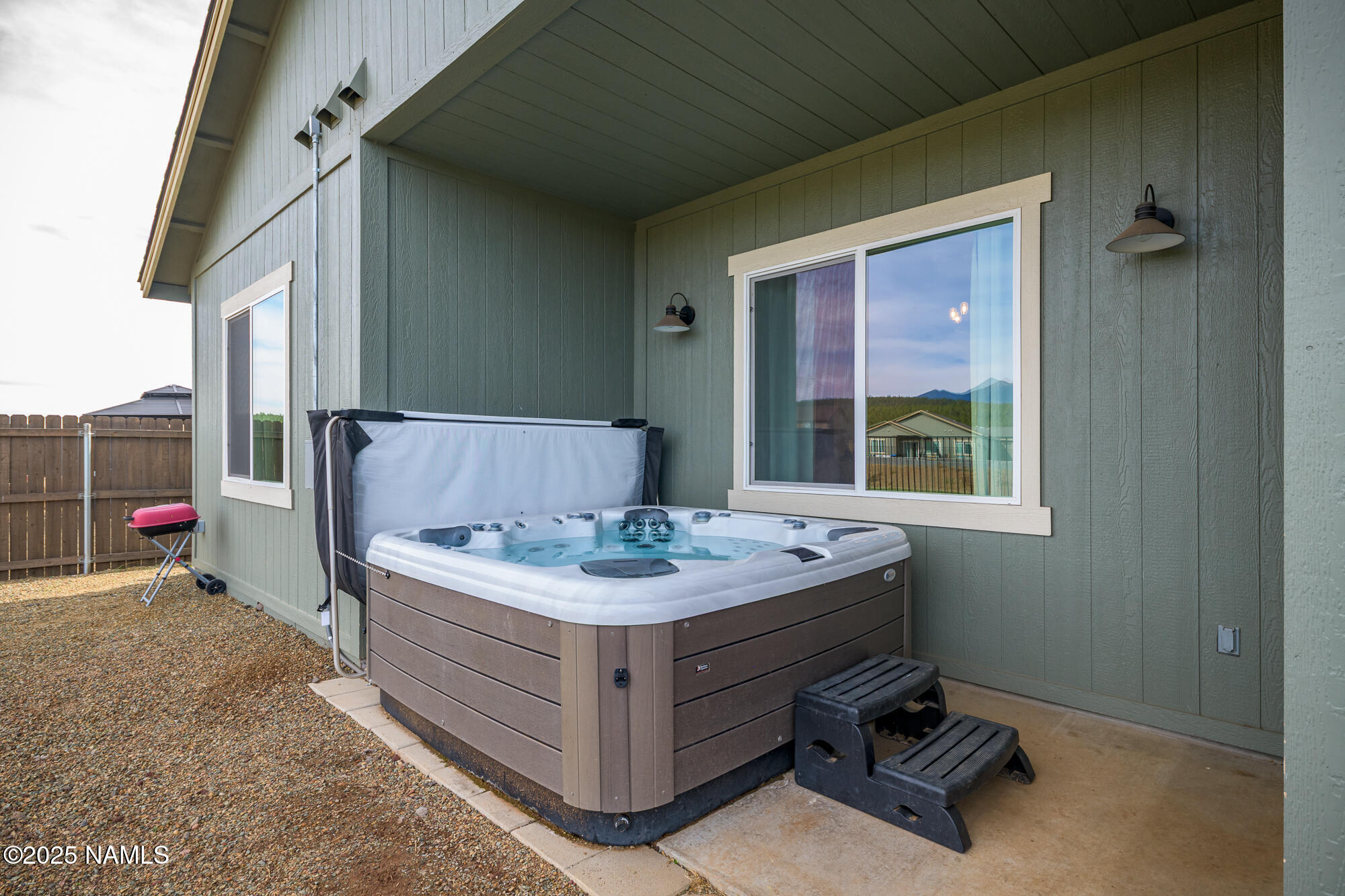 11780 Pegasus Road Bellemont, AZ 86015 - Photo 41 of 44 a bathroom with a sink and a mirror