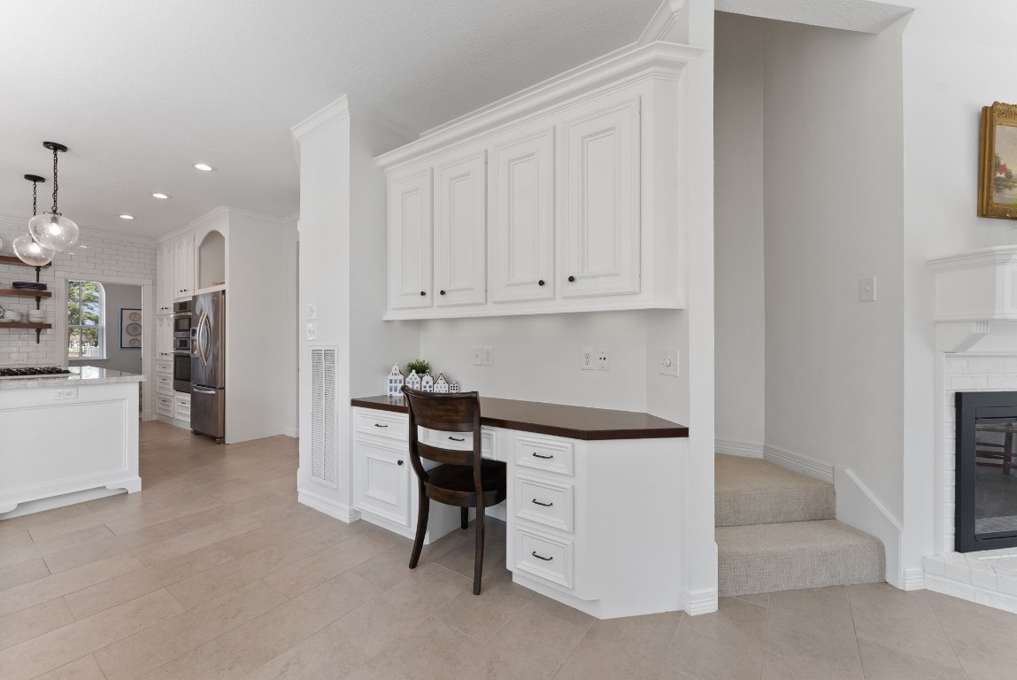 5503 Winding Ridge Drive Spring, TX 77379 - Photo 19 of 50 Extra desk space adds a nice touch to the functionality of the kitchen.