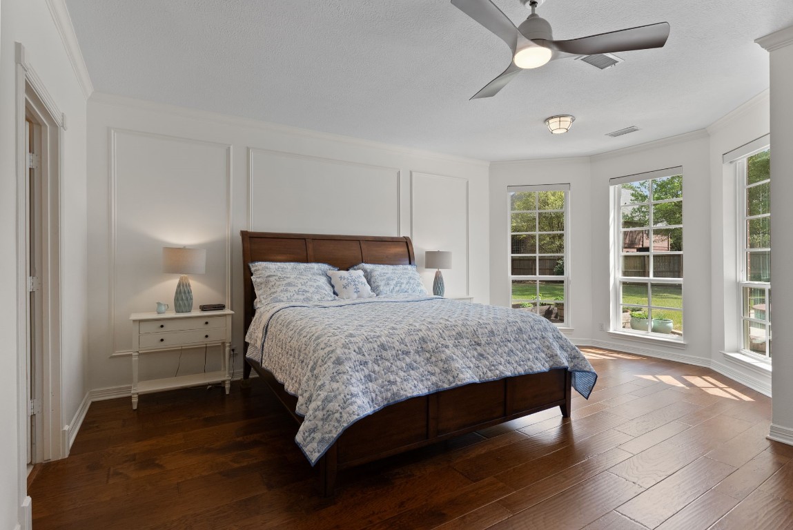 5503 Winding Ridge Drive Spring, TX 77379 - Photo 22 of 50 Crown molding, wall molding, ceiling fan, hardwood floors and plenty of space for your oversized furniture!