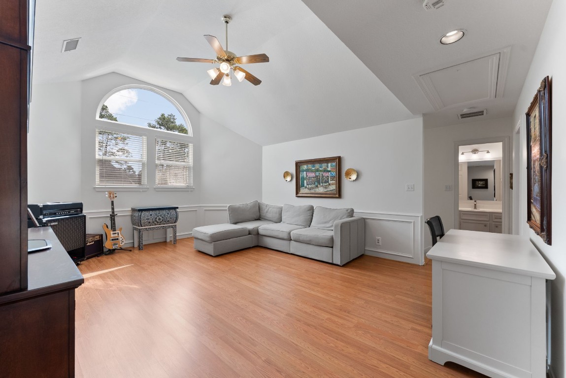 5503 Winding Ridge Drive Spring, TX 77379 - Photo 28 of 50 Spacious gameroom with high vaulted ceiling, box molding and nice backyard views.