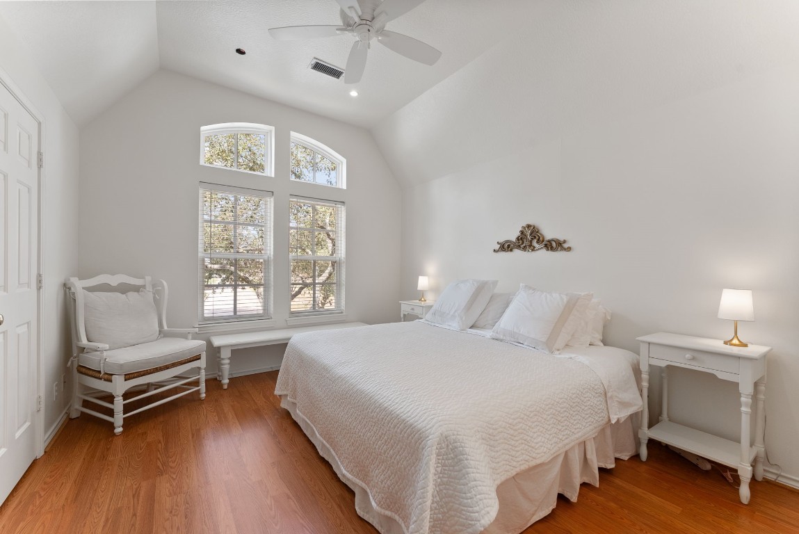 5503 Winding Ridge Drive Spring, TX 77379 - Photo 32 of 50 All secondary bedrooms have hard surface flooring, neutral paint and nice windows. This bedroom features a high vaulted ceiling as well.