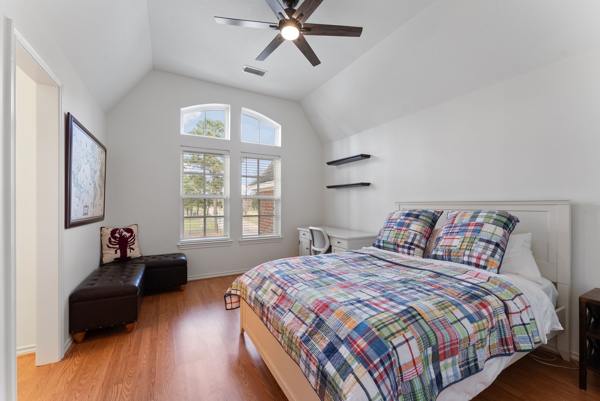 5503 Winding Ridge Drive Spring, TX 77379 - Photo 33 of 50 Another secondary bedroom with high vaulted ceiling, ceiling fan, large walk-in closet and en suite bathroom.