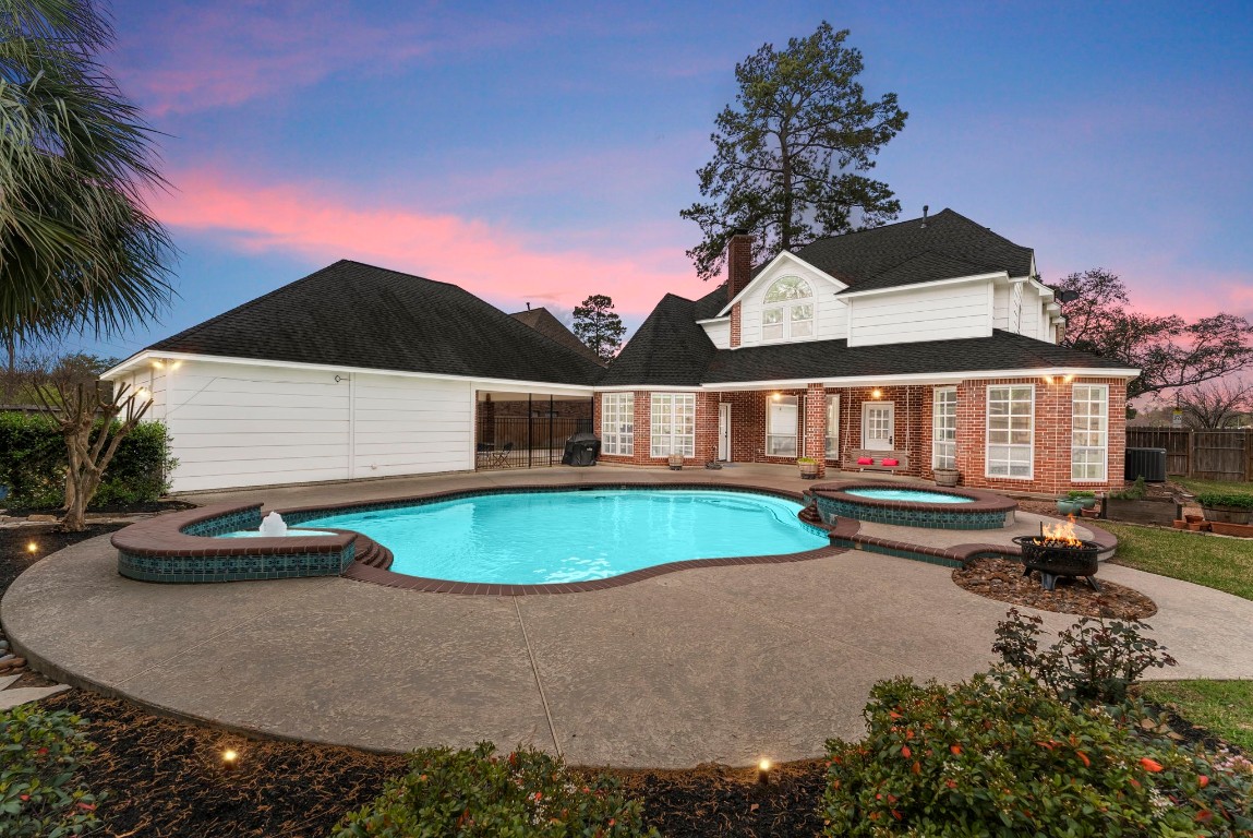 5503 Winding Ridge Drive Spring, TX 77379 - Photo 35 of 50 Imagine dinner al fresco followed by a refreshing dip in the pool or a night in the hot tub while enjoying the firepit!