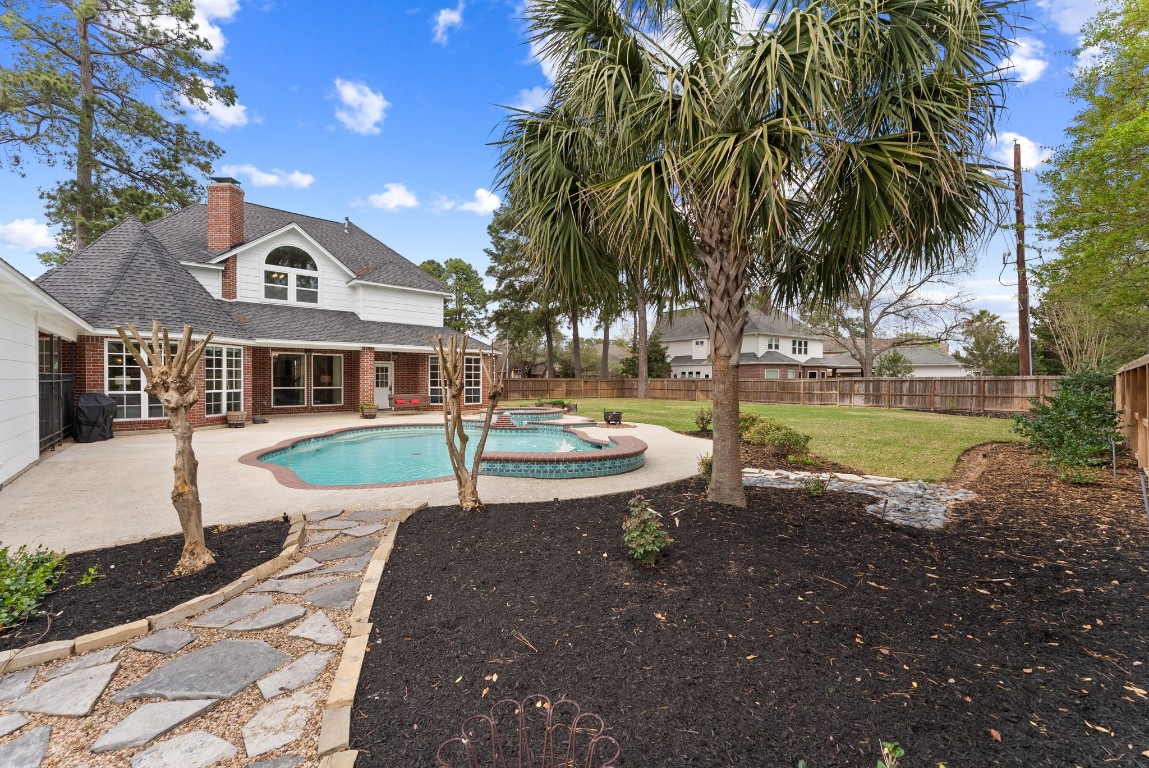 5503 Winding Ridge Drive Spring, TX 77379 - Photo 36 of 50 This large pool has hosted so many outdoor parties for all the family and friends. There are endless areas for different types of fun in this oversized backyard.